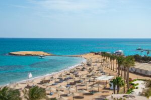 Aerial Beach View with Azure Ocean and Umbrellas, Hurghada, Egypt